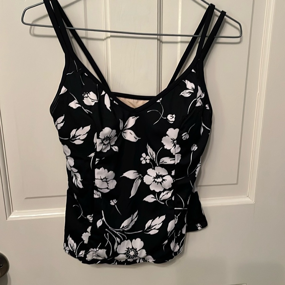 Miraclesuit tankini top; worn twice.  Front v-neck, Lite molded cups. Flatters